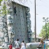 Climbing the wall at the Pizza Festival.